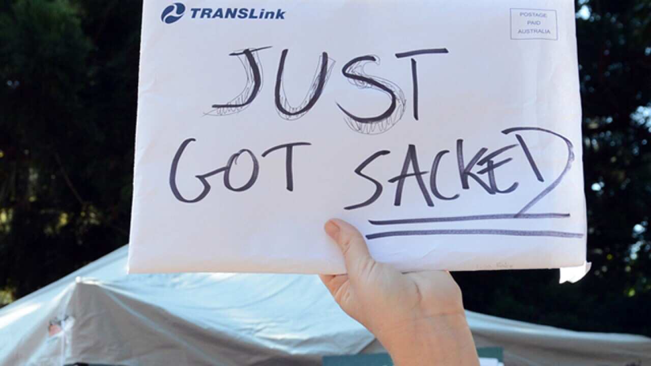 File photo of workers rallying