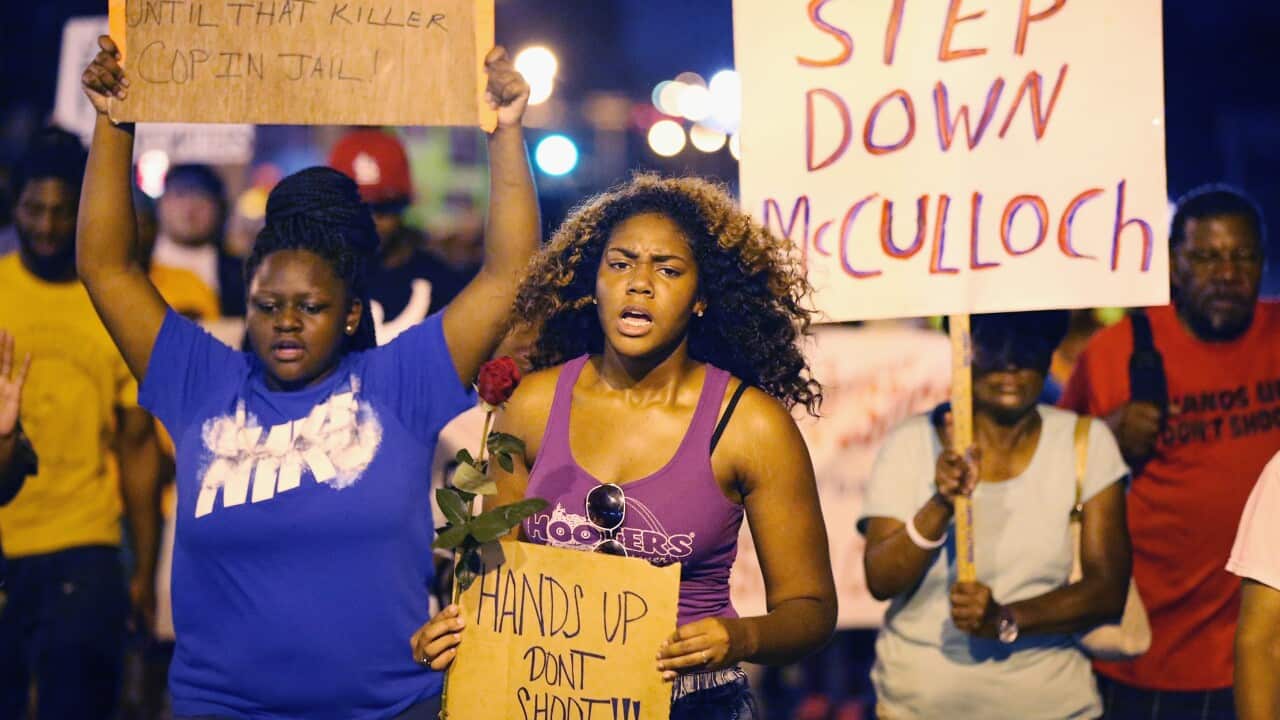 Demonstrators protest the killing of teenager Michael Brown in Ferguson (Getty)