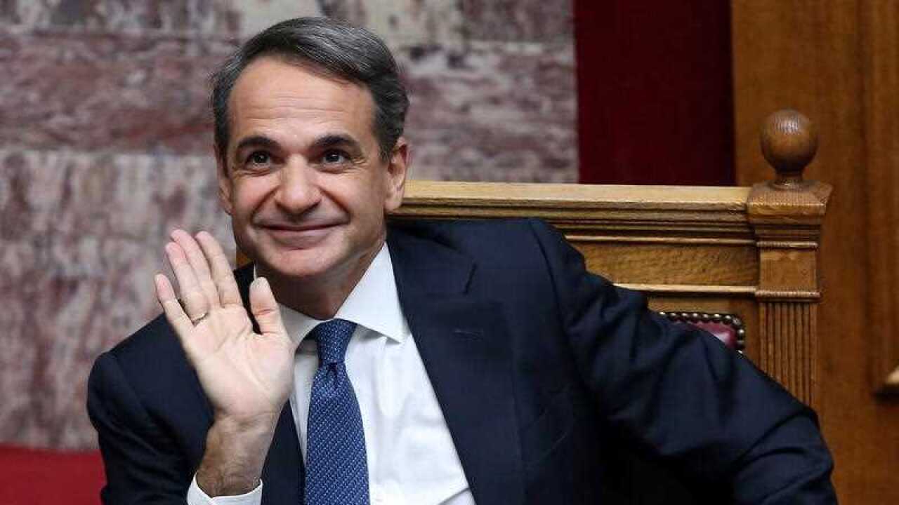 Greek Prime Minister Kyriakos Mitsotakis waves during a debate on motion of censure, at the Greek Parliament, in Athens, Greece, 27 January 2023. Greek main opposition SYRIZA - Progressive Alliance leader Alexis Tsipras, tabled a motion of censure against the government, accusing Prime Minister Kyriakos Mitsotakis of orchestrating mass wiretaps of political allies and foes. The three-day debate in Parliament on the motion of censure against the government tabled by the main opposition party, SYRIZA-Progressive Alliance, will be concluded on 27 January with the speeches of the political party leaders. EPA/ORESTIS PANAGIOTOU READ LESS