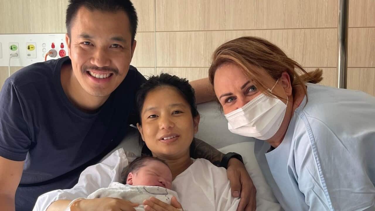New parents Chitra and Mamata Pun Rana with their baby boy.