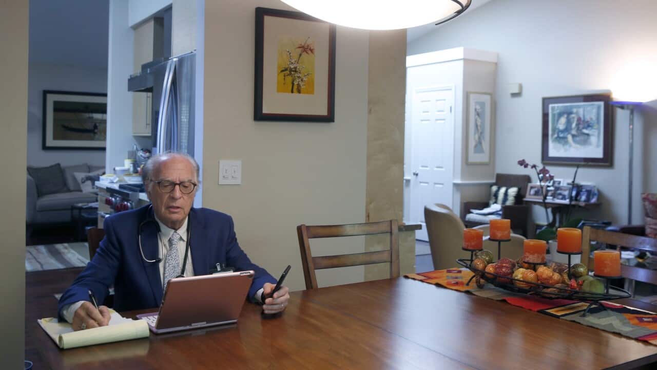 A doctor in California consults a patient remotely