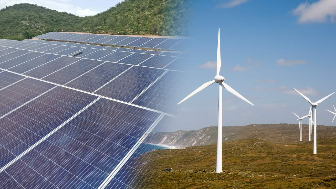 A split image with solar panels on the left and wind turbines on the right.