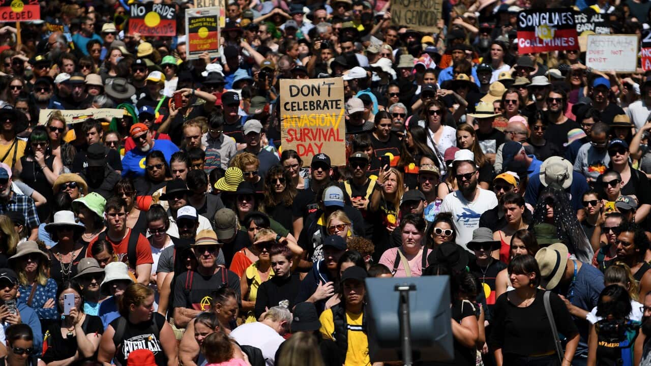 Protesters are seen during the Invasion Day rally in Melbourne last year.