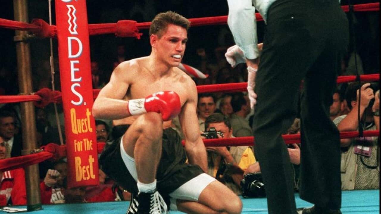 Troy Waters of Australia fails to get back on his feet.