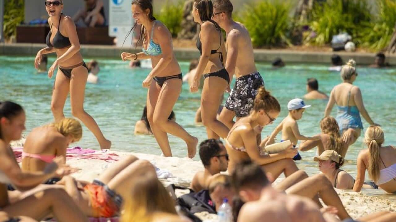 Crowds gather at Streets Beach at Southbank, Brisbane.