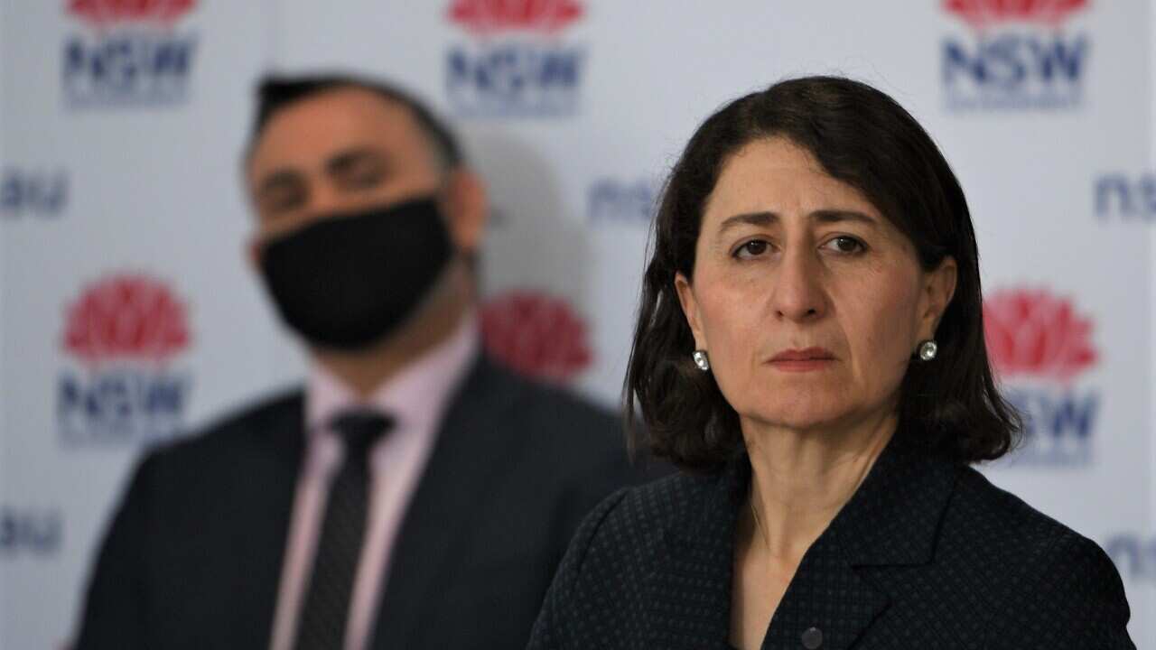 NSW Premier Gladys Berejiklian and Deputy Premier John Barilaro speak to the media during a press conference in Sydney, Friday, August 3, 2021. (AAP Image/Dean Lewins) NO ARCHIVING
