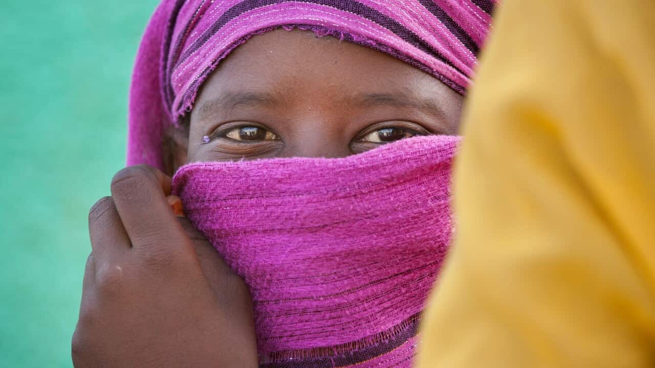 Sudan, Khartoum State, Khartoum, sudanese woman hiding her face under a veil