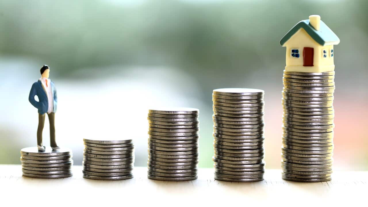 money savings and own house purchase-Stack of coins