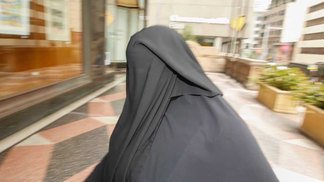 Moutia Elzahed arrives at the Downing Centre district court, in Sydney, Monday, February 19, 2018. (AAP Image/Glenn Campbell) NO ARCHIVING.
