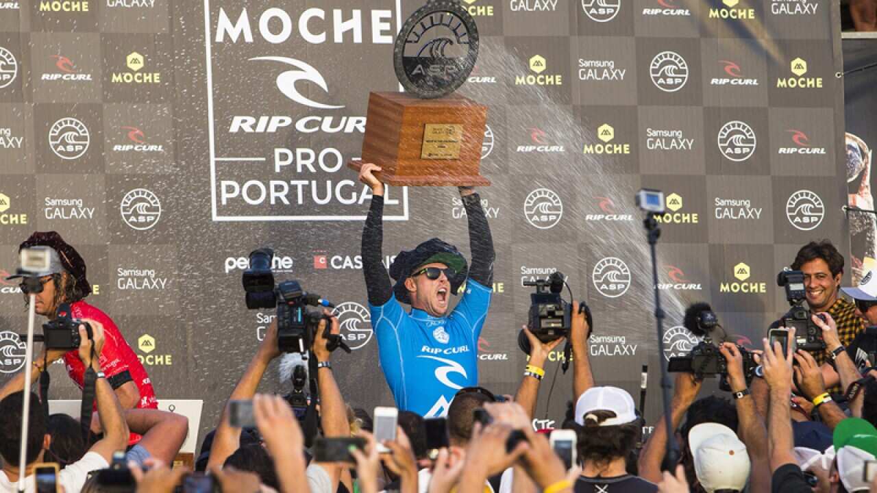 Mick Fanning celebrates his win.