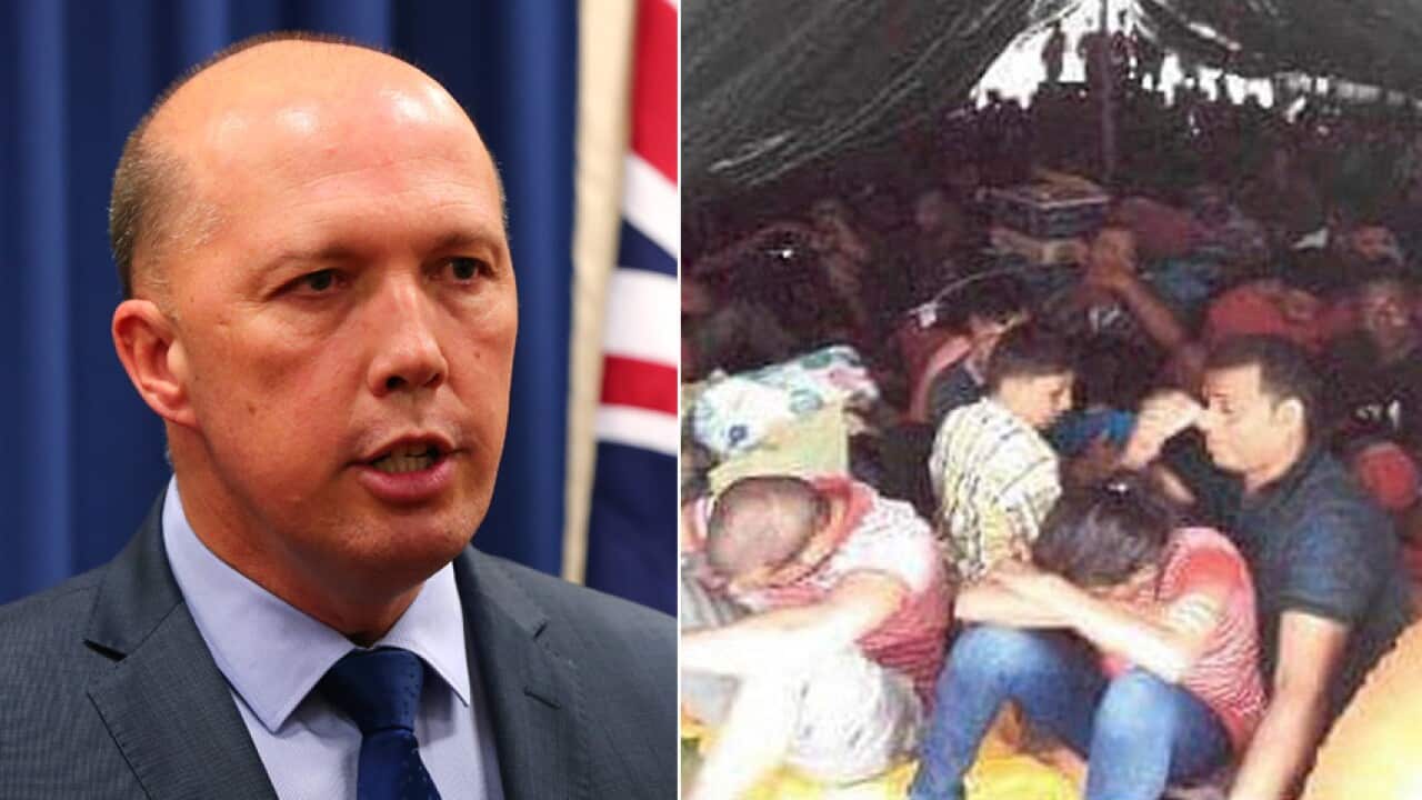 The Royal Malaysian Police released this photo of illegal migrants on a rusty tanker in Johor state, Malaysia on Saturday.