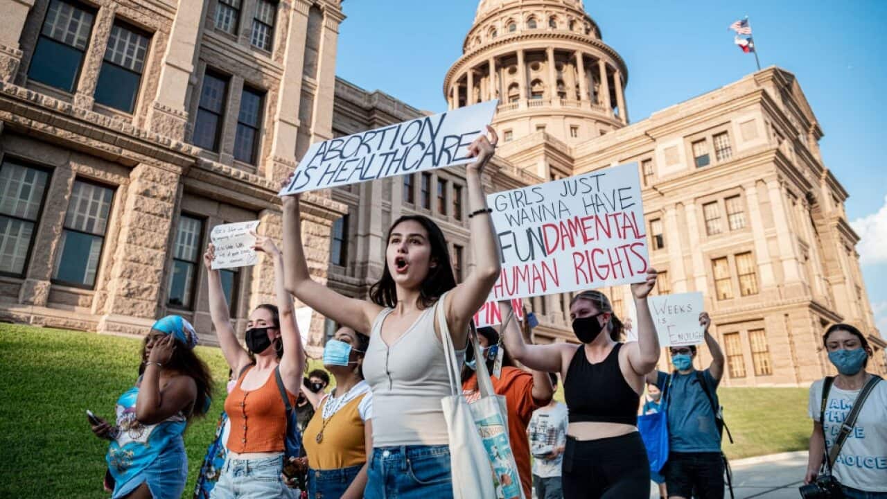 Pro-choice protesters march outside the Texas State Capitol