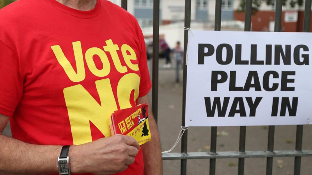 A No supporter outside a polling station in Glasgow