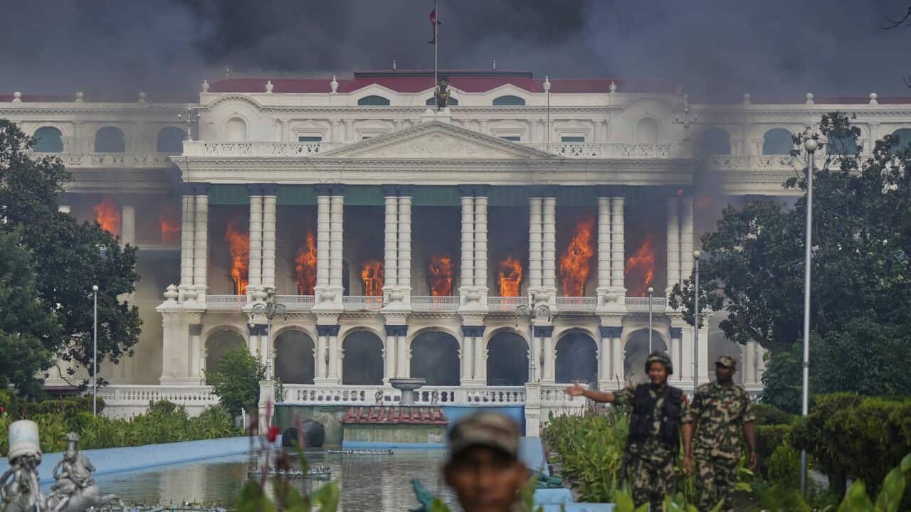 Nepali government buildings have been set on fire (AAP)