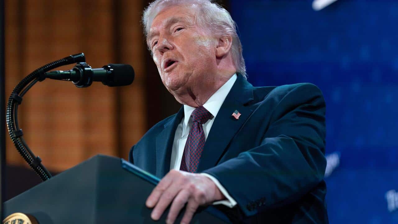 Donald Trump speaking at podium