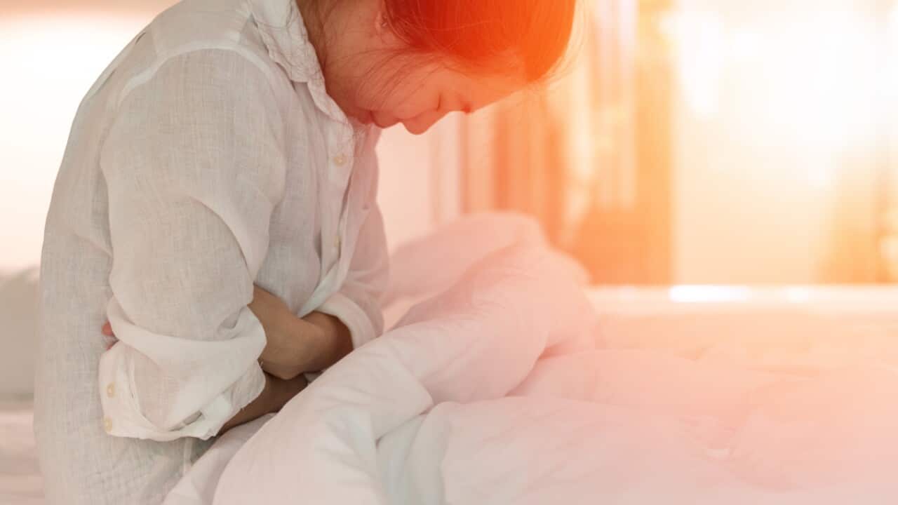Menstrual pain stomachache medical healthcare concept. Hands of young woman on stomach as suffer from pelvic, cramp, indigestion, gastrointestinal, diarrheas or female diseases problem