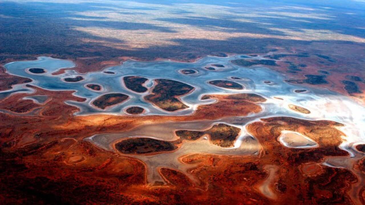 Aerial view of Central Australian salt lake. The saltlakes litter the landscape between Alice Springs and Yulara, Oct. 28, 2006. (AAP Image/Terry Trewin) NO ARCHIVING