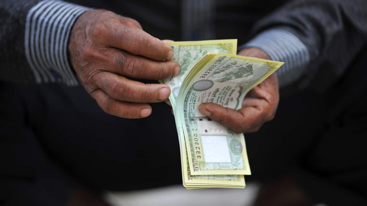 Nepalese people lining to exchange New banknotes for Dashain