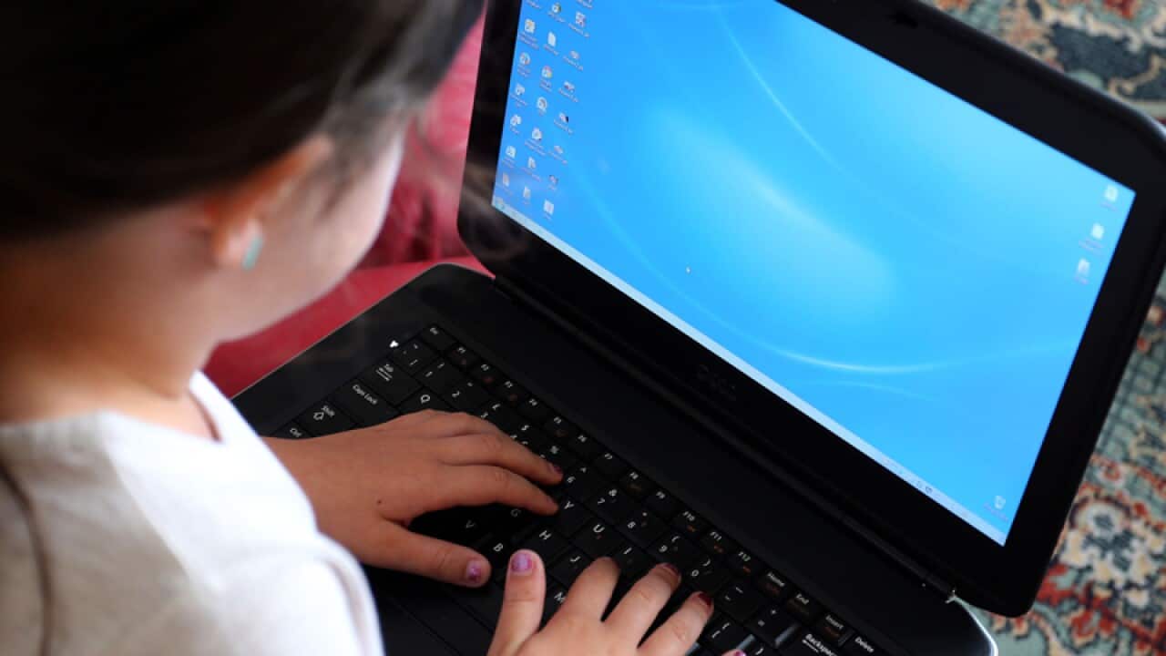 A child on a laptop computer