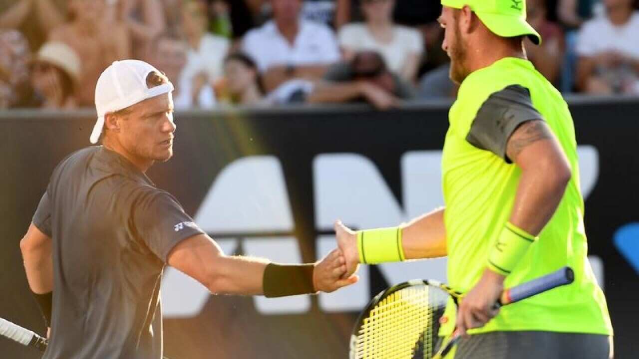 Sam Groth (right) and Lleyton Hewitt of Australia in action.