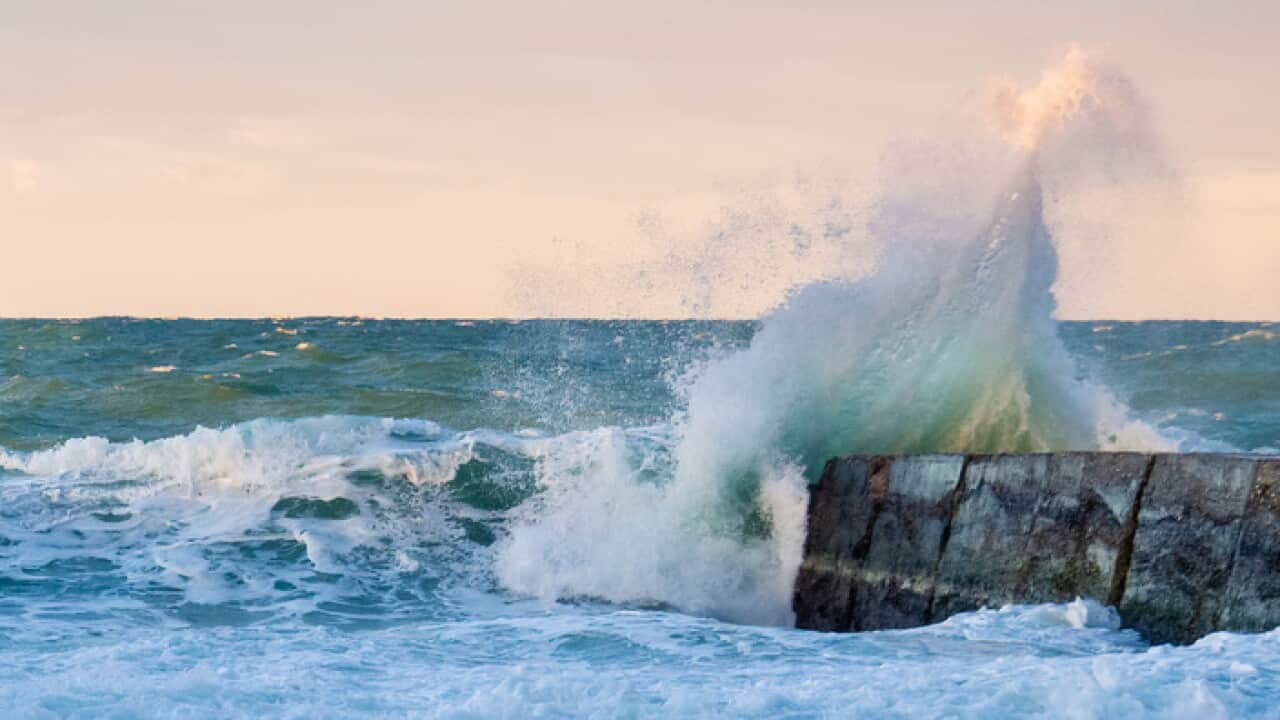 The waves of the Ionian sea hit the beaches of Schiavonea in
