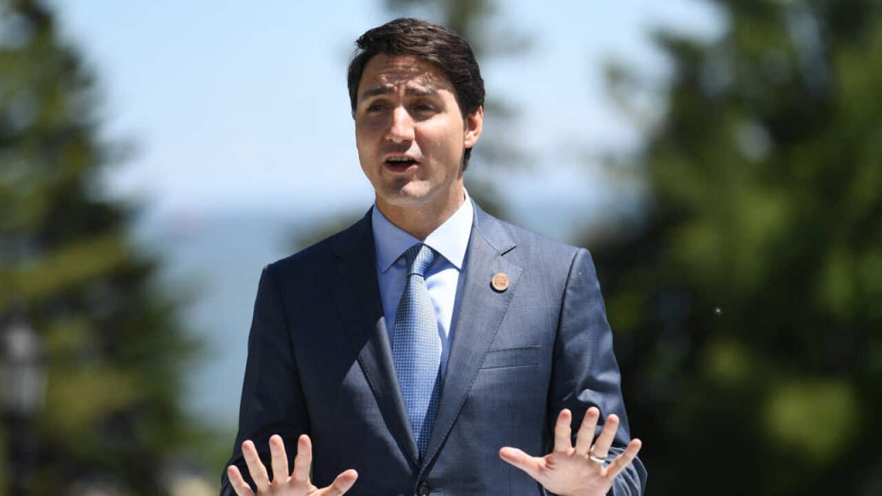 Canadian Prime Minister Justin Trudeau gestures at the G7 Outreach Official Welcome on day two of the G7 Summit.