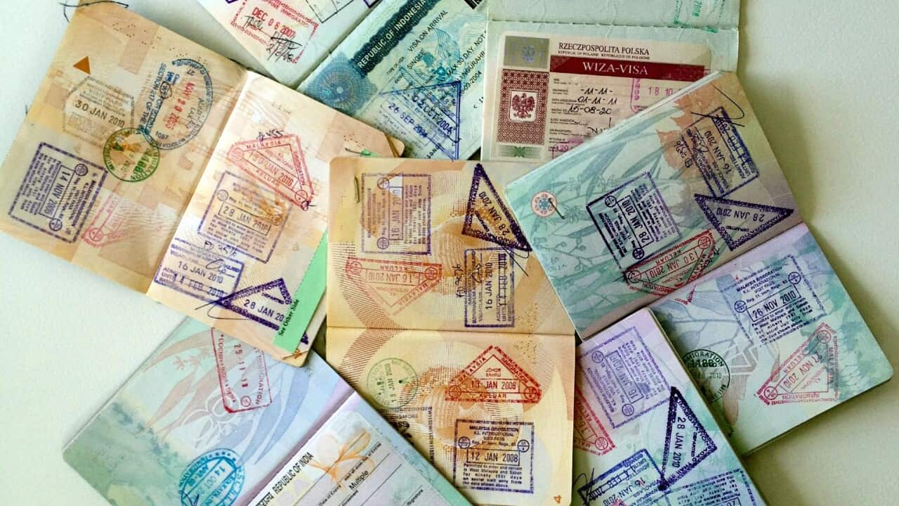 Visas stamped on passport.