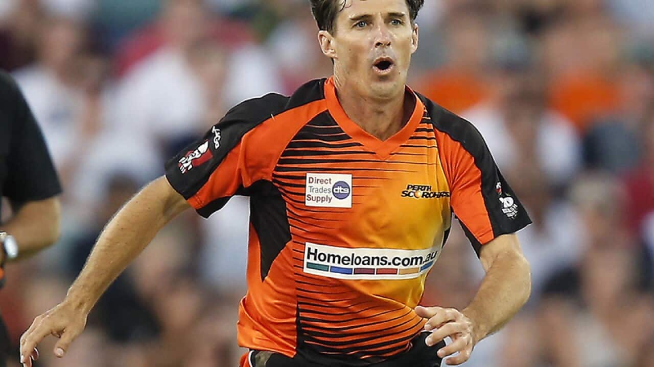 Scorchers Brad Hogg reacts after bowling a delivery