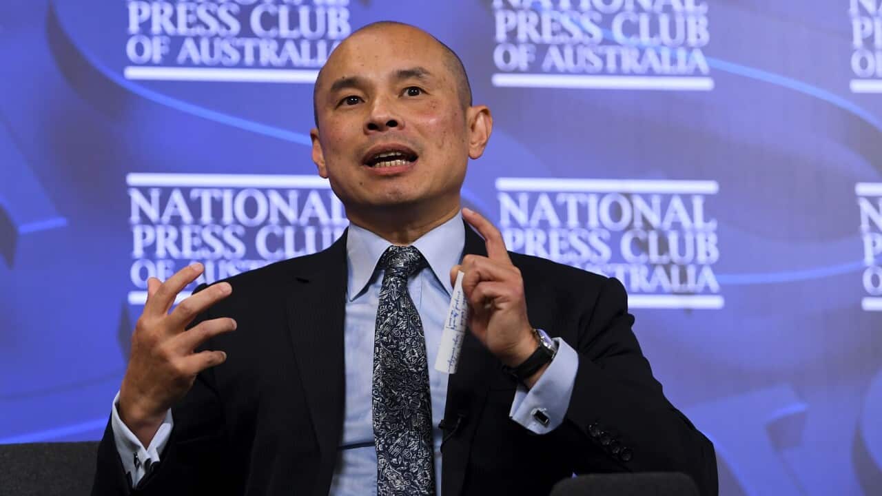 Deputy Head of Mission of the Chinese Embassy in Australia Wang Xining attends the launch of the new China Story Yearbook 2020: Crisis, at the National Press Club in Canberra, Wednesday, April 21, 2021. (AAP Image/Lukas Coch) NO ARCHIVING