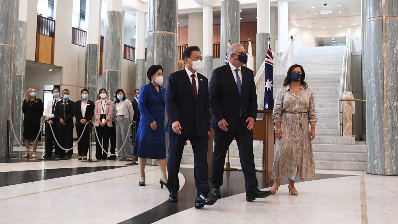 Australian Prime Minister Scott Morrison with First Lady Jenny Morrison walk together with South Korean President Moon Jae-in and First Lady Kim Jung-sook.