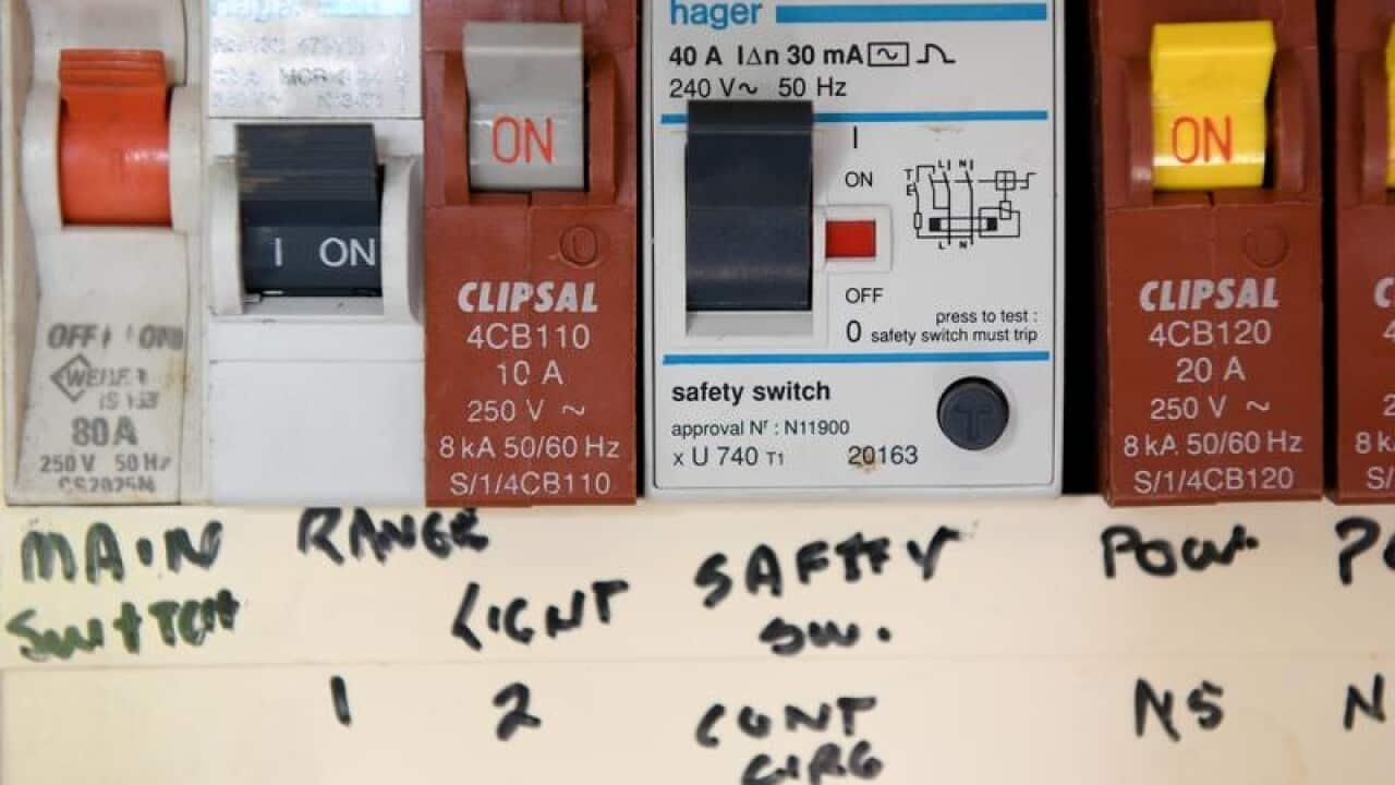 Electrical circuit switches are seen inside a meter box