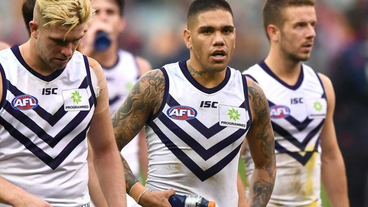 Freemantle star Michael Walters (C)