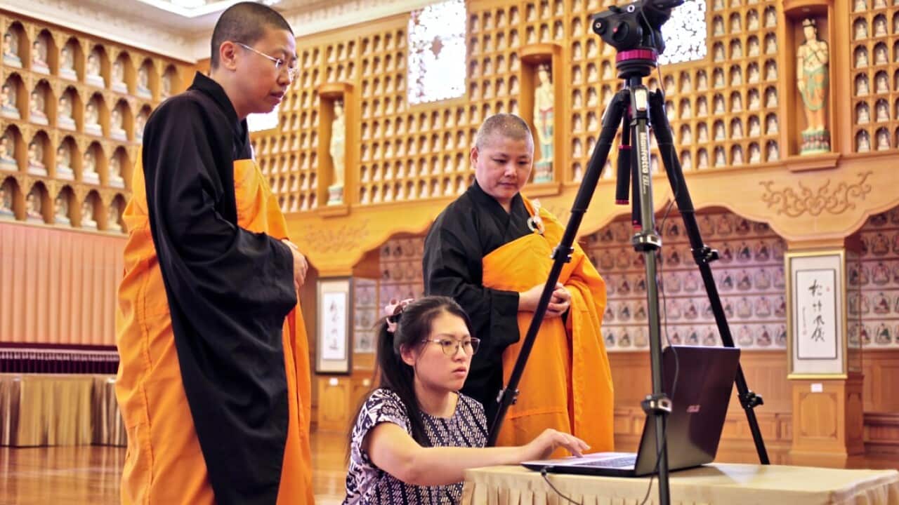 Volunteers at Perth's Fo Guang Shan temple are helping to live stream religious teachings 