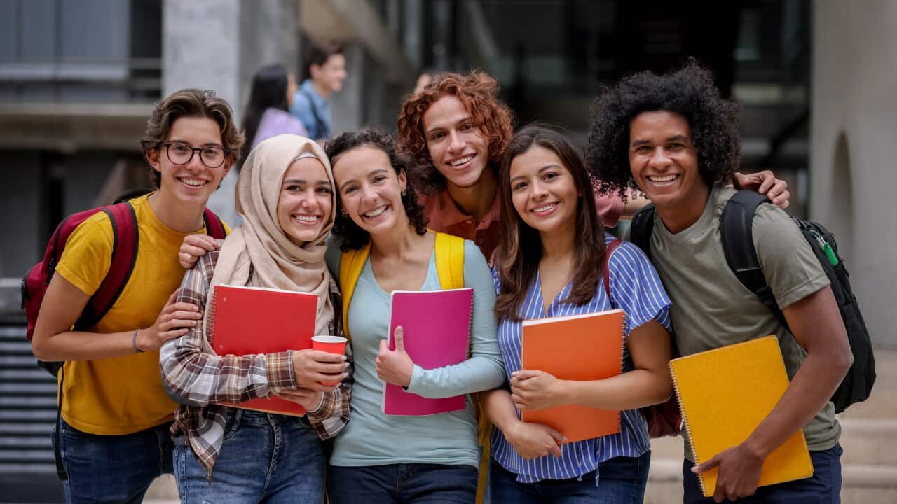Multi-ethnic group of Latin American college students smiling