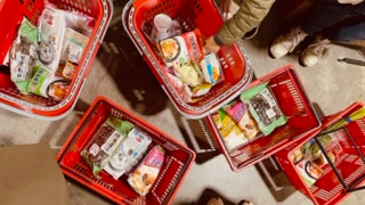 Asian groceries in shopping baskets