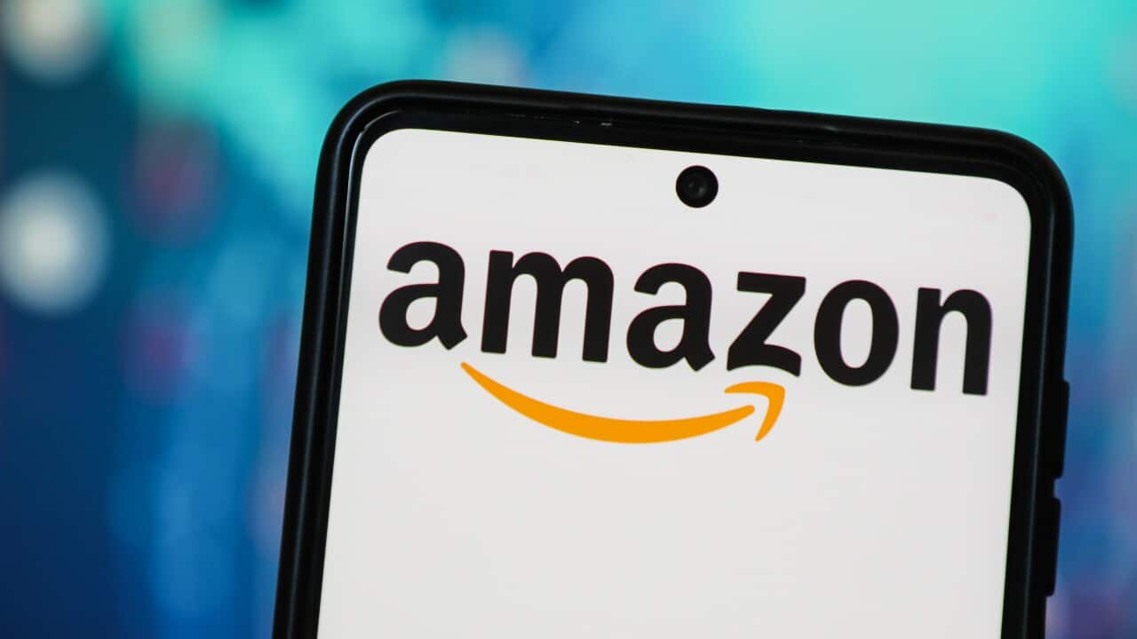 A photo of a mobile phone with the Amazon logo