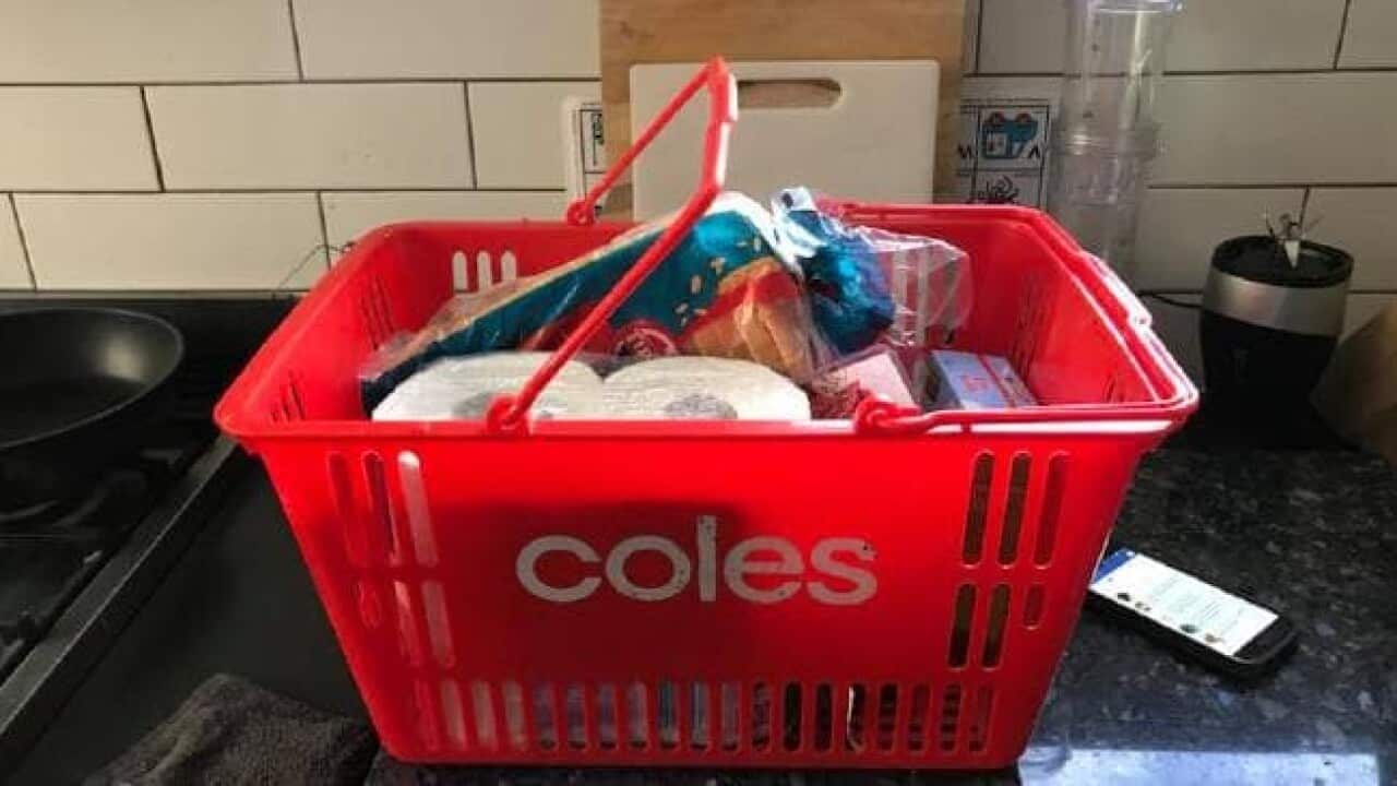 Coles basket has been taken home by shopper