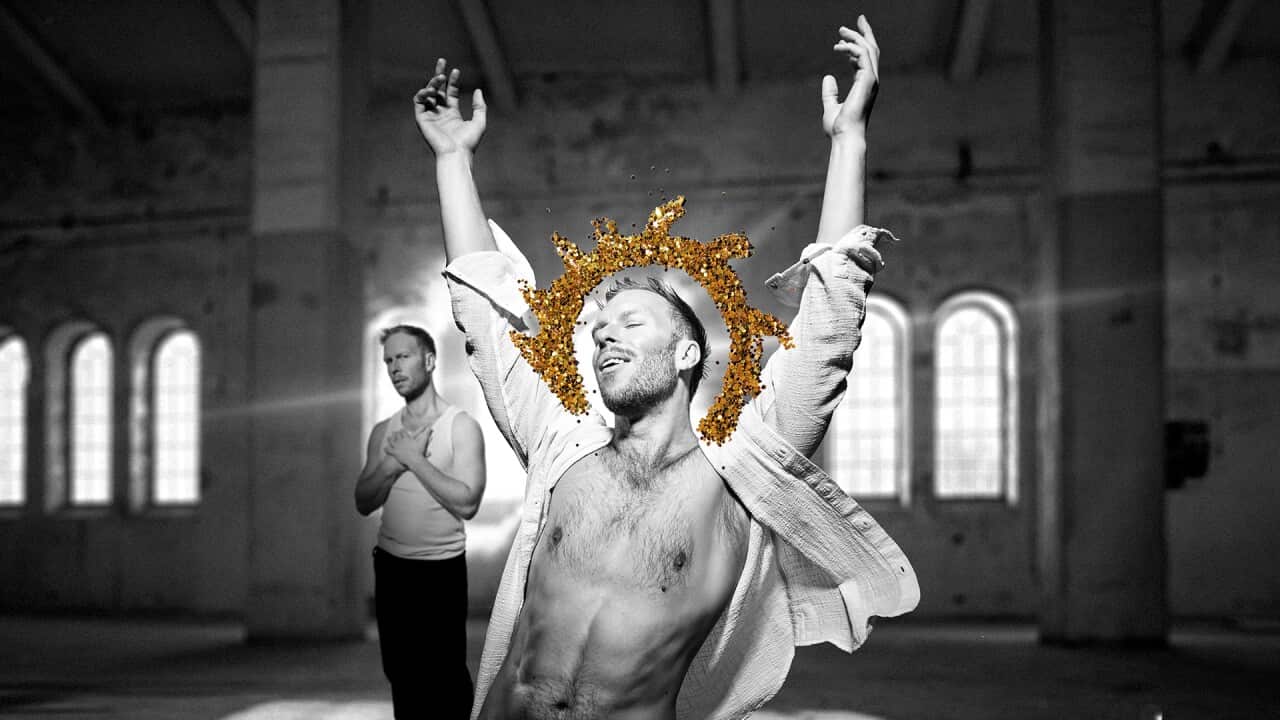 BMX stunt and jump riding in a hall with sunlight.