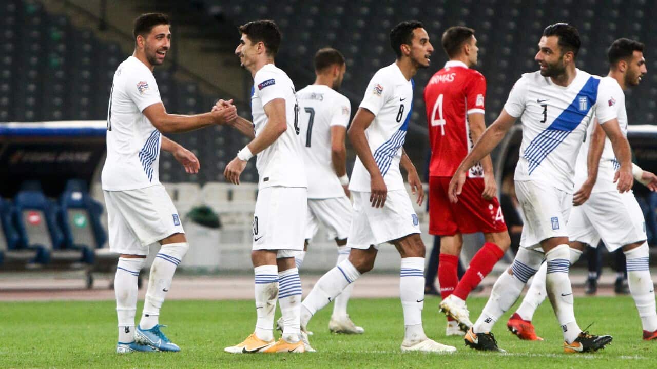 Players of Greece celebrate their second goal during the UEFA Nations League soccer match between Greece and Moldova at OAKA Stadium in Athens, Greece, 11 October 2020.