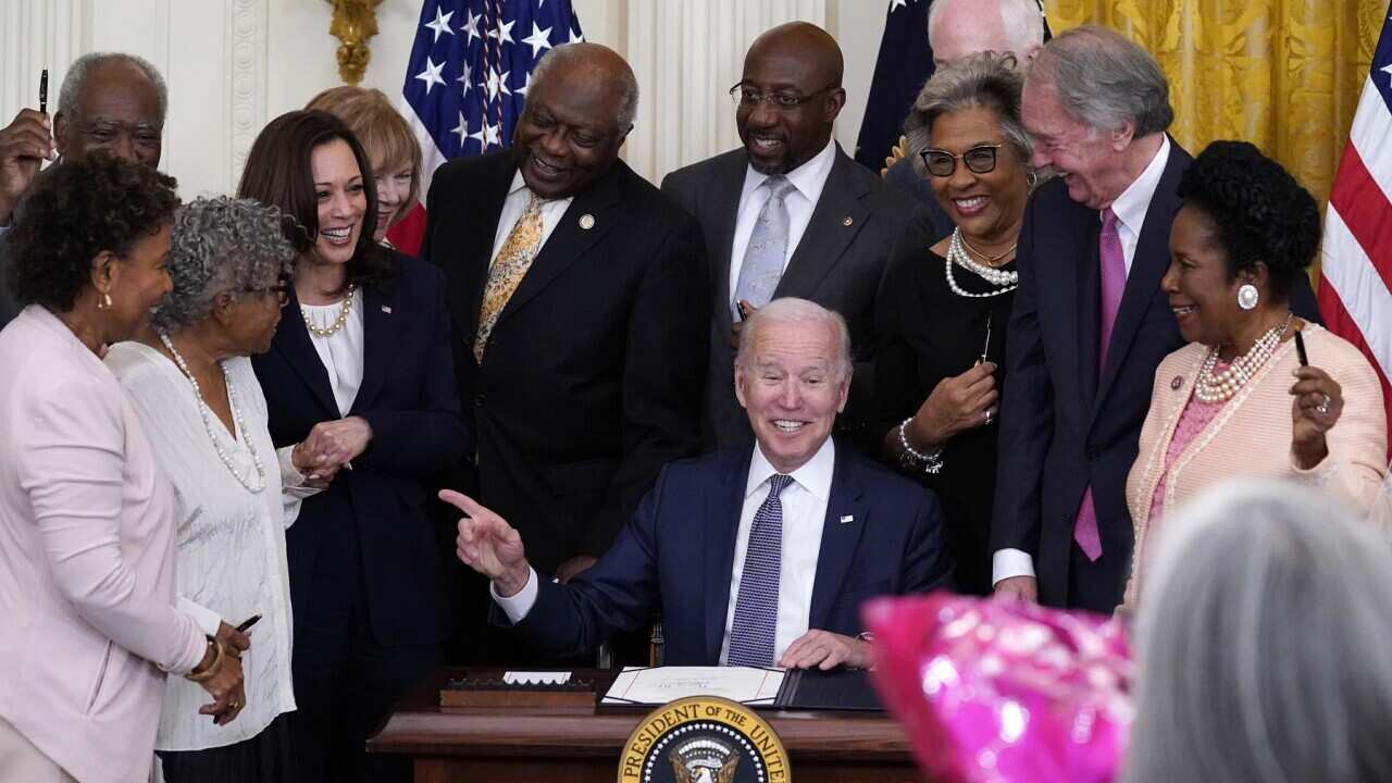 President Joe Biden signing the Juneteenth National Independence Day Act