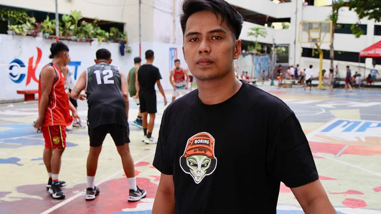 Carlos Belvis at a basketball court