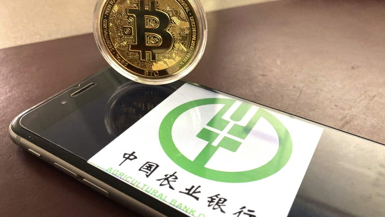China bans cryptocurrency transactions | SBS News