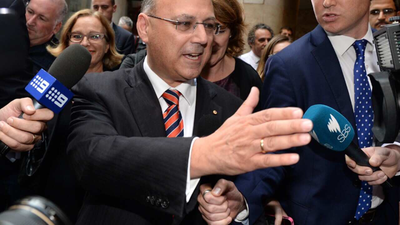 Senator Arthur Sinodinos leaves the ICAC