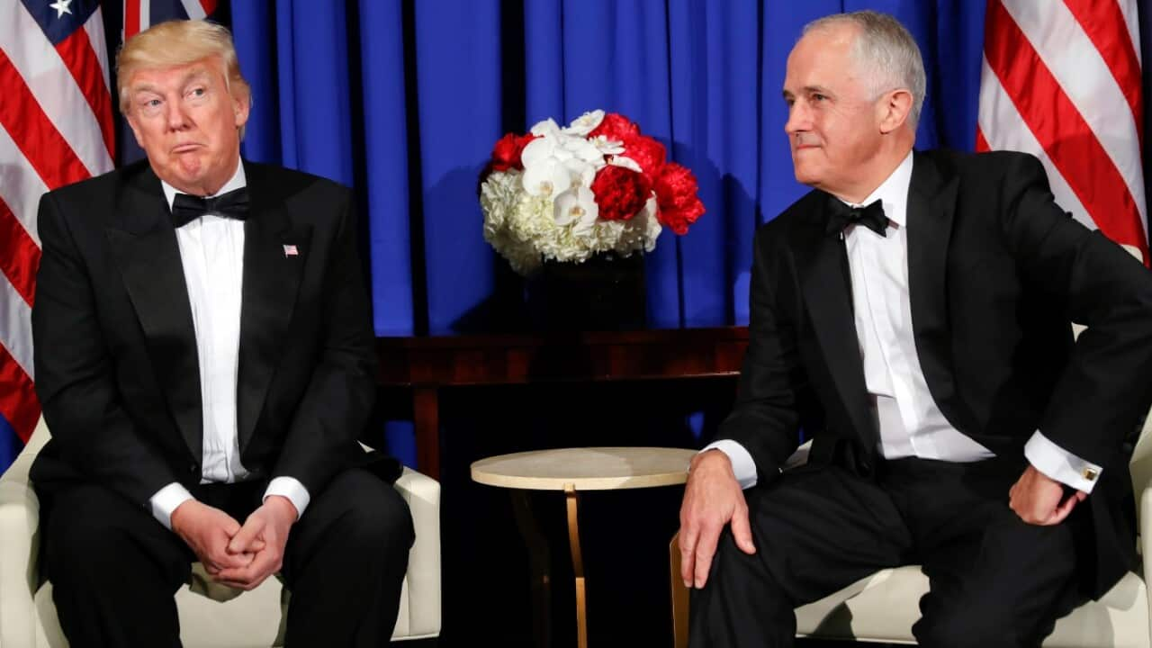 President Donald Trump extends his hand to Australian Prime Minister Malcolm Turnbull during their meeting on May 4