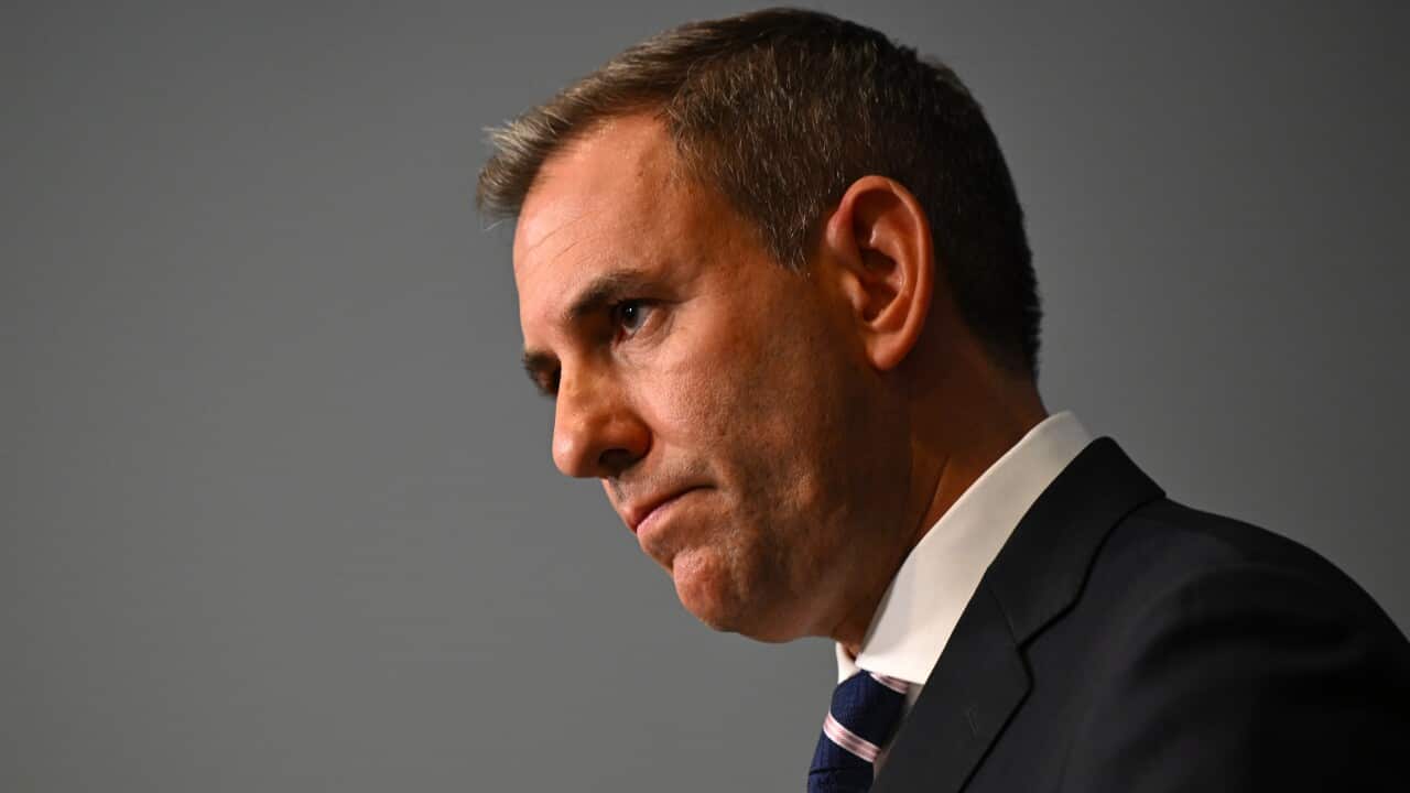 A man wearing a dark suit