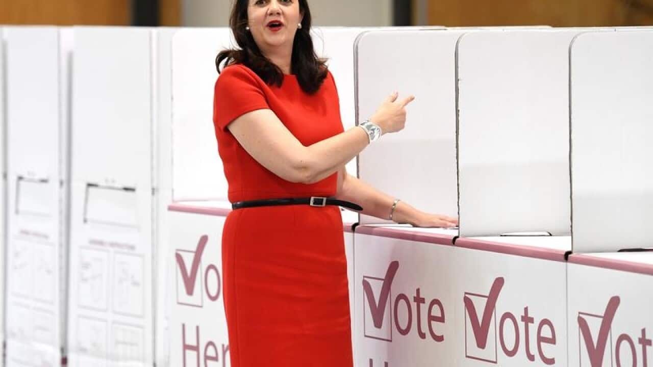 Queensland Premier Annastacia Palaszczuk casts her vote.