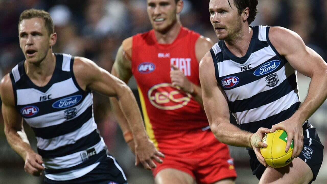 Geelong players Joel Selwood (L) and Patrick Dangerfield