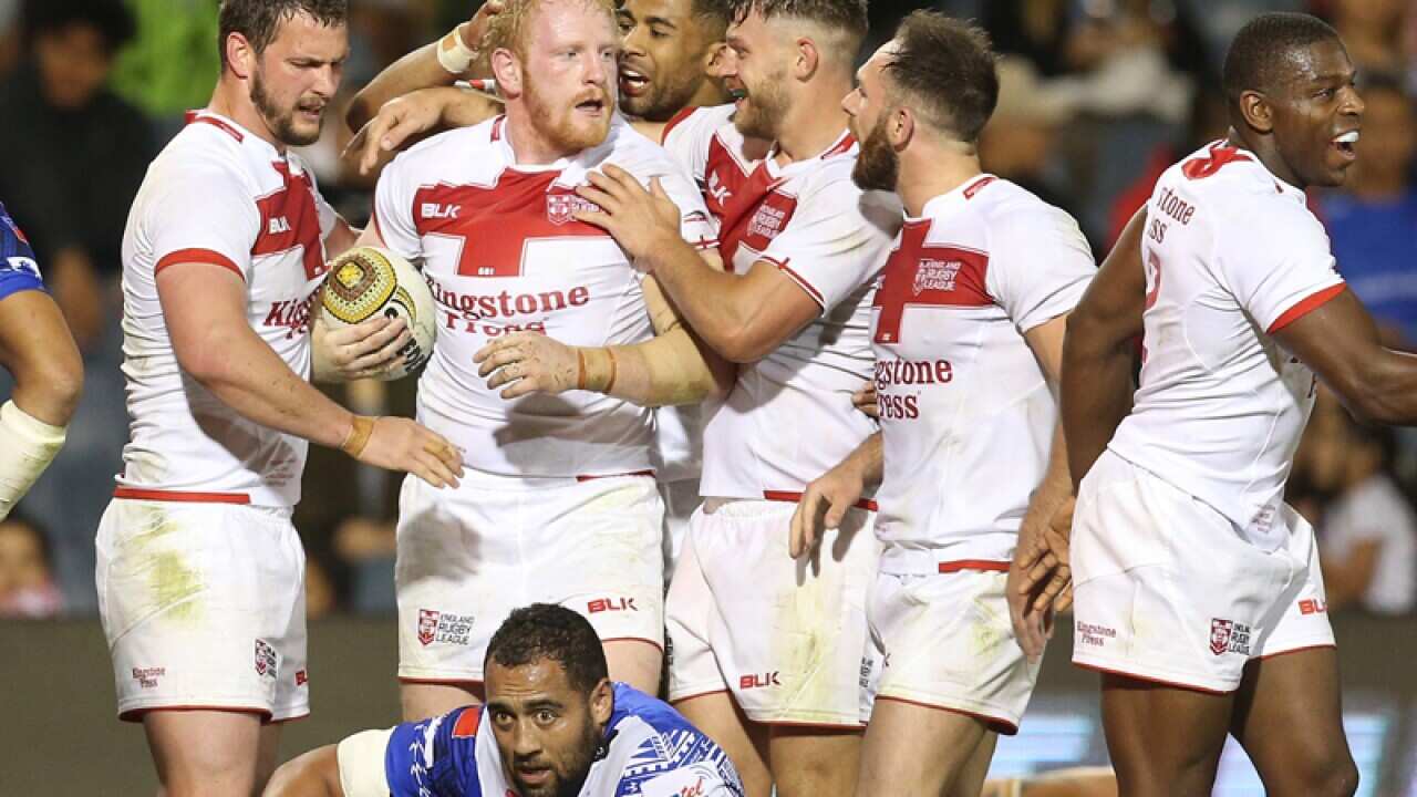 The England rugby league team celebrate