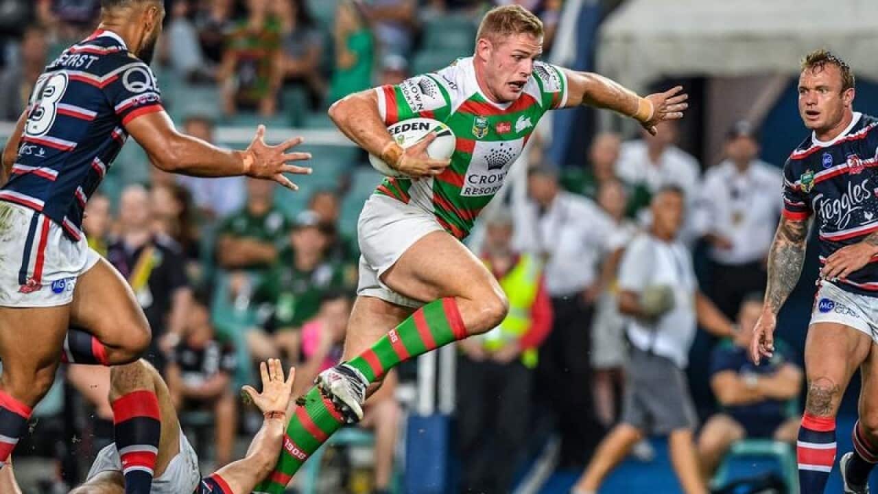 Thomas Burgess makes a bust for South Sydney.