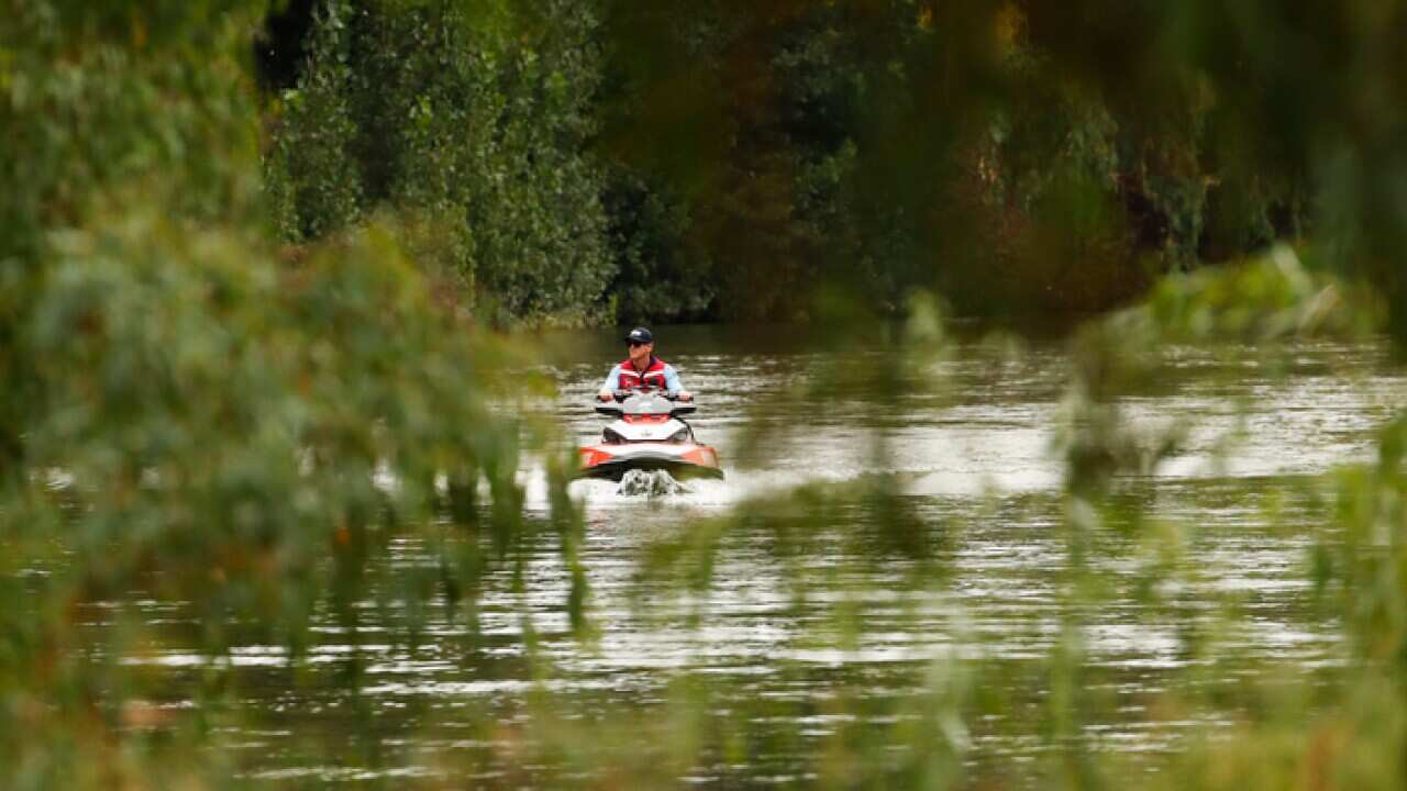 Searching for a missing swimmer in a river